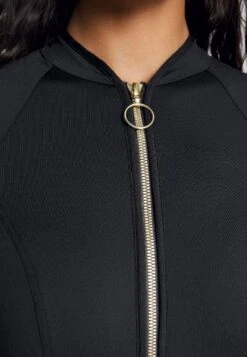 Seafolly Collective Long Sleeve Sunvest - Bikinitop - Black 9 Seafolly Collective Long Sleeve Sunvest - Bikinitop - Black -Only Mode Winkel 9b90c481ebde4fdebbbe1544bc76cc89