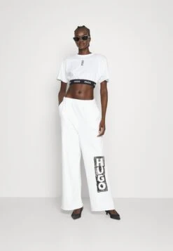 Hugo Nasuede - Trainingsbroek - White -Only Mode Winkel a7a33eca6d2c4cda935fe4ddb38a67f1
