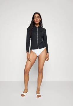 Seafolly Collective Long Sleeve Sunvest - Bikinitop - Black 6 Seafolly Collective Long Sleeve Sunvest - Bikinitop - Black -Only Mode Winkel cf9e83872d234e12913e62615a7633a3